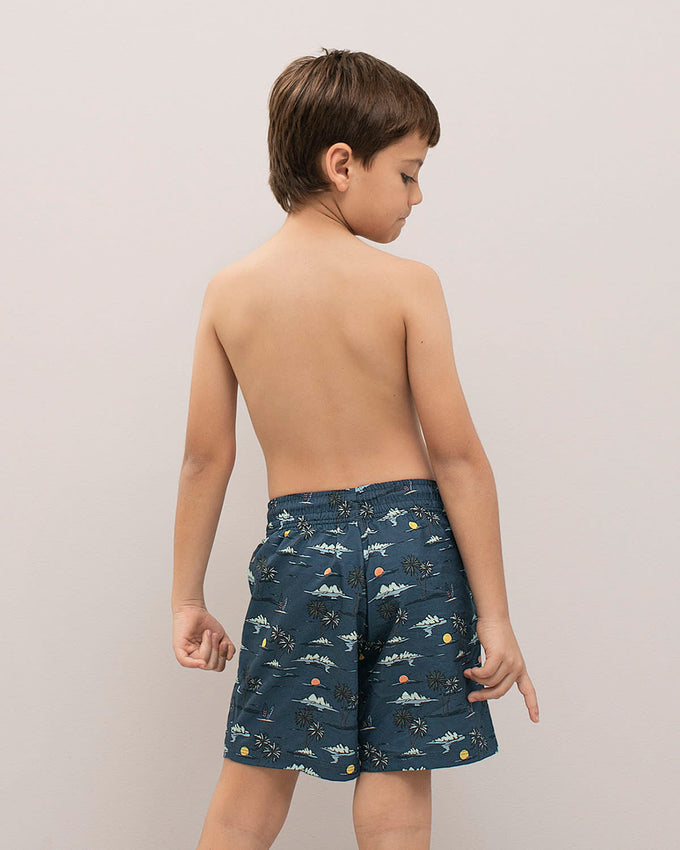 Pantaloneta de baño para niño con bolsillo lateral#color_b39-estampado-azul