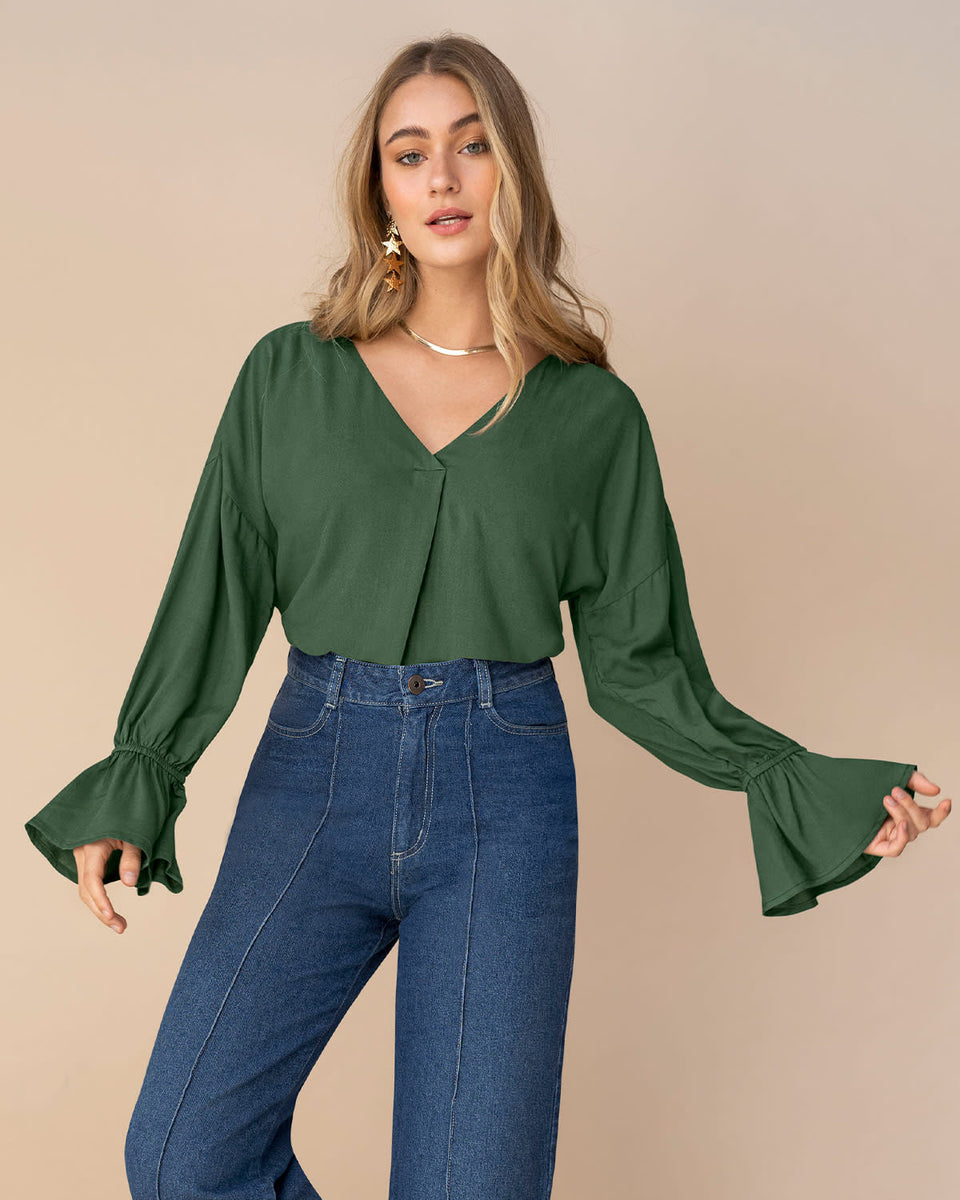 Blusa manga larga con escote en V y puños con elásticos