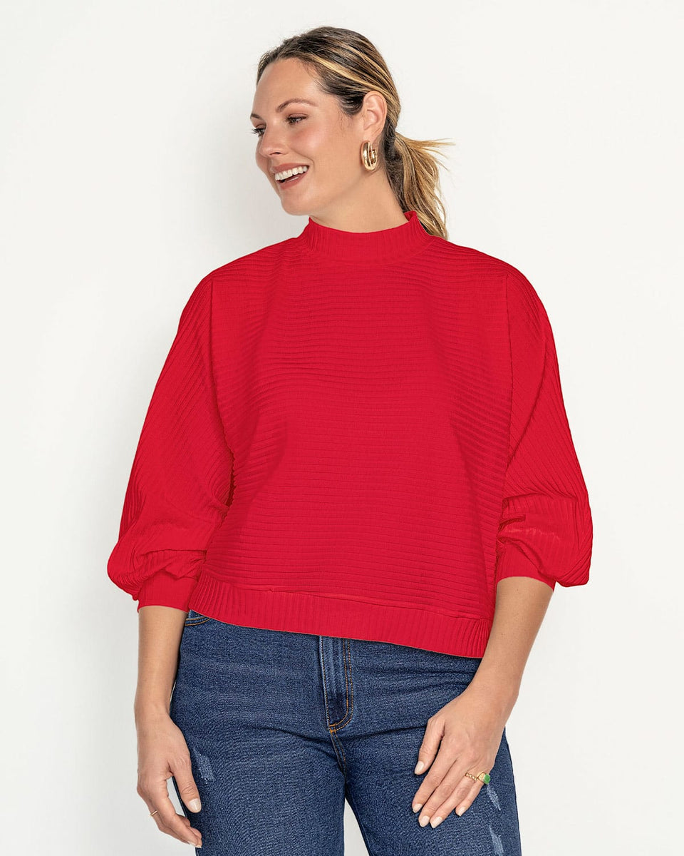 Buzo manga larga cuello tortuga de mangas con volumen