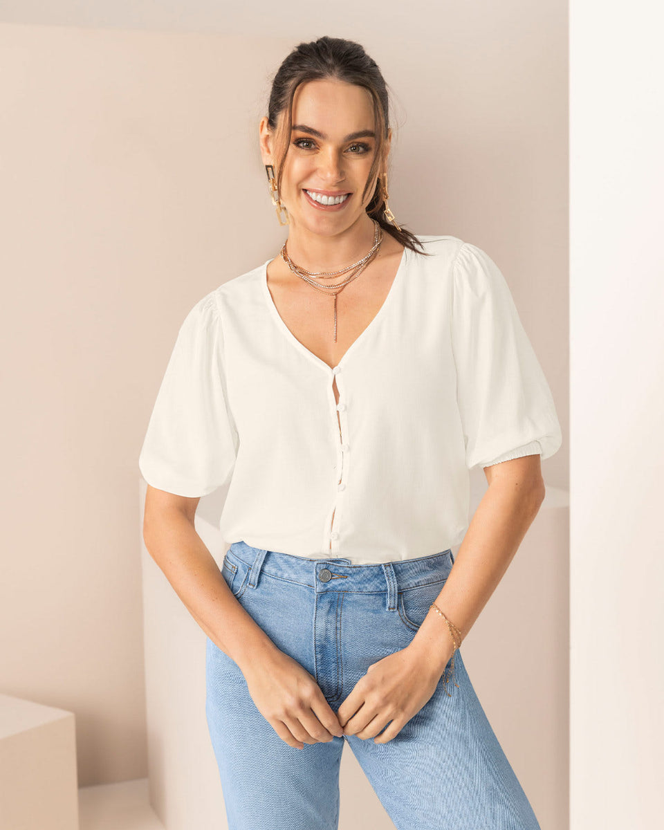 Camiseta manga 3/4 con botones con ojales