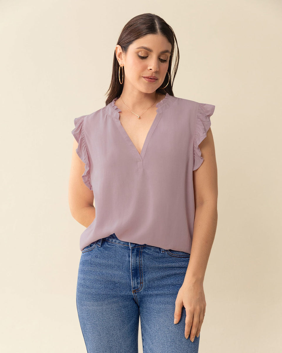 Blusa con boleros en cuello y mangas