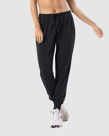 Jogger deportivo de silueta amplia con bolsillos#color_700-negro