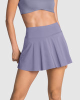 Falda deportiva con short interno con bolsillo#color_410-morado