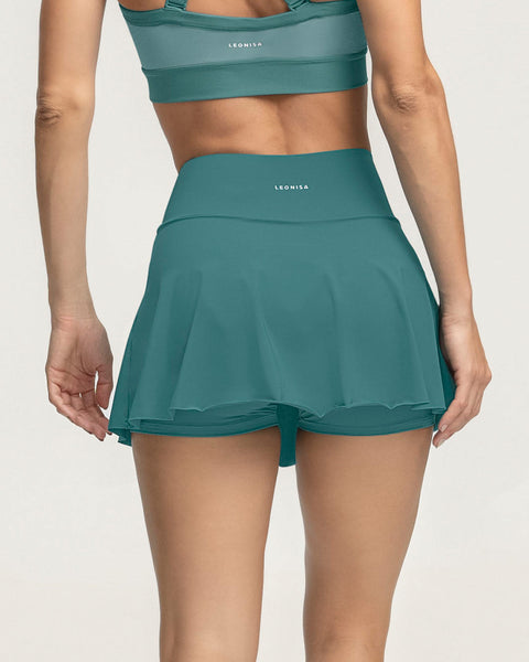 Falda deportiva con short interno con bolsillo#color_632-verde-indigo