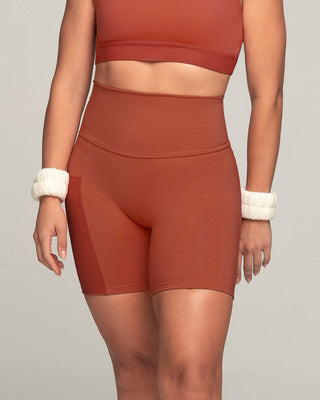 Short ciclista con bolsillo lateral y control de abdomen#color_336-rojo-canela