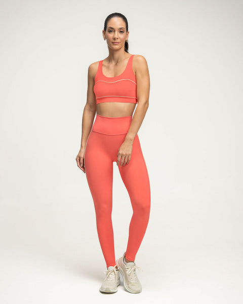 Top deportivo con cargaderas dobles en espalda#color_369-coral