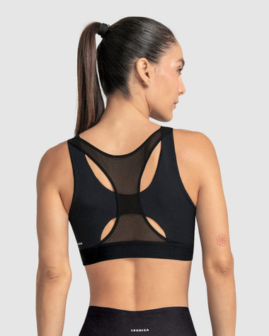 Top deportivo espalda atlética con detalles en tul#color_700-negro