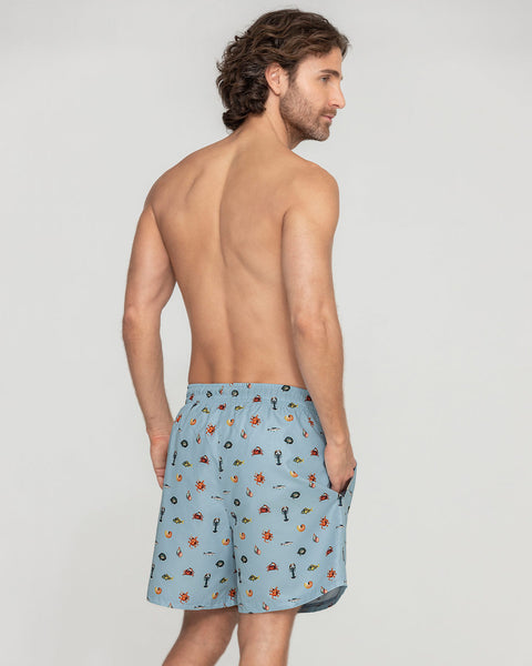 Pantaloneta de baño masculina con práctico bolsillo al lado derecho#color_a62-estampado-azul-limones