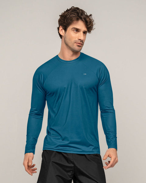 Camiseta deportiva masculina manga larga con protección UV#color_599-azul-medio