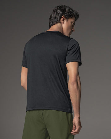 Camiseta deportiva con tela texturizada y transpirable#color_700-negro
