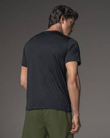 Camiseta deportiva con tela texturizada y transpirable#color_700-negro