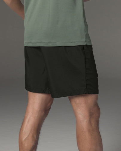 Pantaloneta deportiva con bolsillos funcionales#color_700-negro