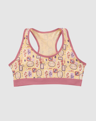 Top con espalda deportiva elaborado en algodón para niña#color_952-amarillo-estampado-flores