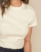 Camiseta manga corta tela acanalada con perlas decorativas en el frente
