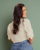 Blusa manga corta tipo globo con botones funcionales