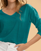 Camiseta manga larga con cuello en V#color_616-aguamarina