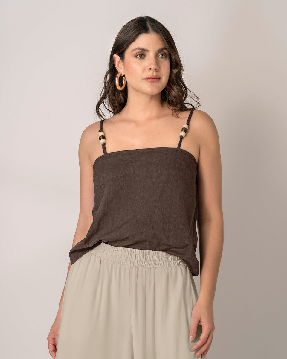 Blusa de tiritas con apliques en madera