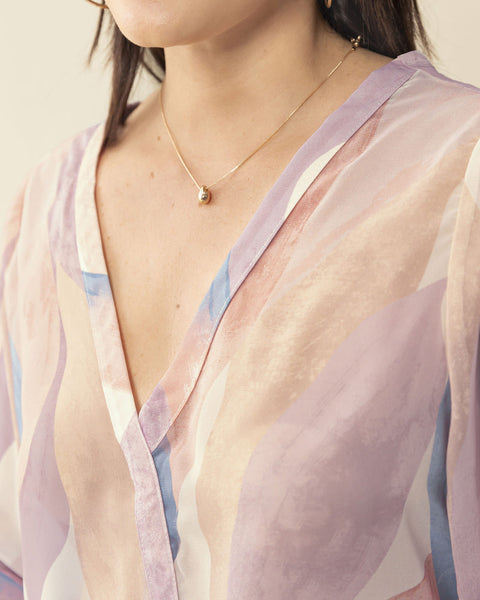 Blusa manga larga estampada con elástico en puños#color_145-estampado-mandarina-azul
