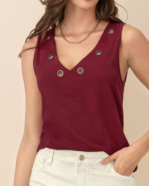 Camiseta manga sisa con ojales metálicos en el cuello#color_349-vino