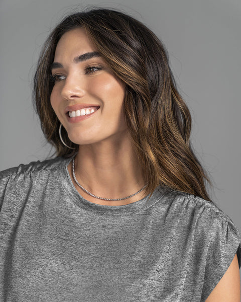 Camiseta manga corta tela con brillo#color_708-plateado