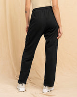 Pantalón largo con elástico en cintura y bolsillos laterales#color_700-negro