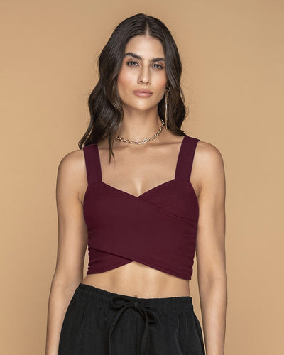 Blusa crop top con escote cruzado#color_349-vino