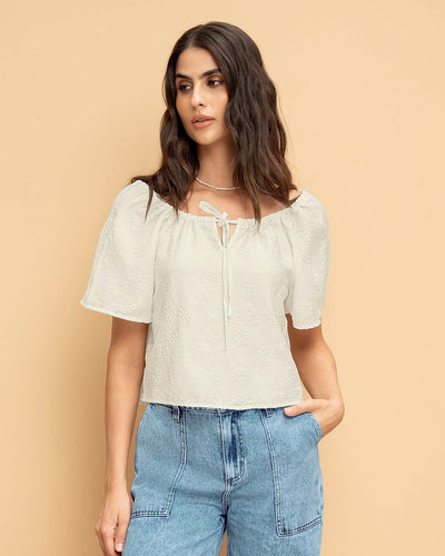 Blusa con estampado en relieve#color_000-blanco