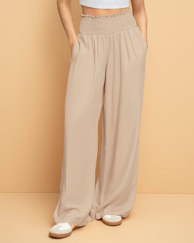 Pantalón bota ancha con nido de abeja en cintura#color_084-arena