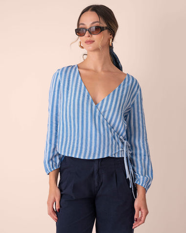 Blusa cruzada de mangas 3/4#color_022-azul-claro