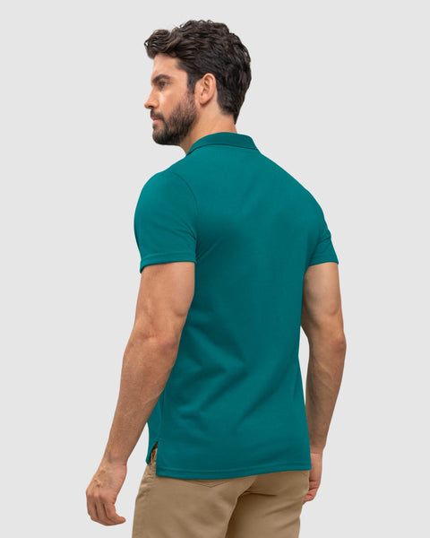 Camiseta tipo polo con botones funcionales con puños y cuello tejido#color_063-verde-botella