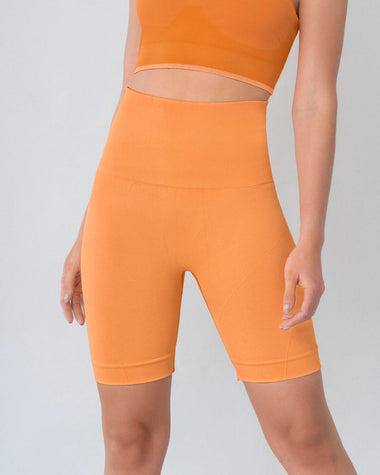 Short ciclista sin costuras control fuerte en abdomen medio y moderado en muslos#color_203-naranja-medio