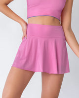 Falda deportiva con short interno con bolsillo#color_368-rosado-claro