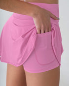 Falda deportiva con short interno con bolsillo