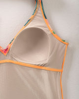 Traje de baño con drapeado en el escote bio-pet#color_204-estampado-hojas-naranja
