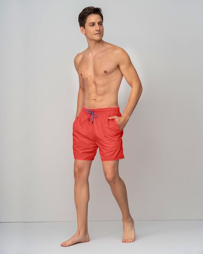 Pantaloneta corta de baño para hombre elaborada con pet reciclado#color_375-coral-neon