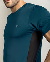 Camiseta tecnológica deportiva con mallas transpirables#color_563-azul-petroleo