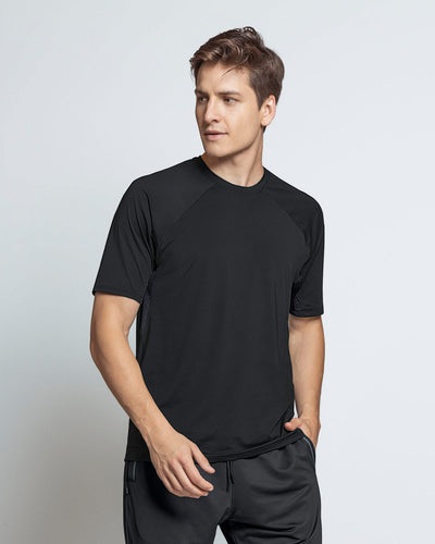 Camiseta deportiva con bolsillo lateral y mallas transpirables en sisa#color_700-negro