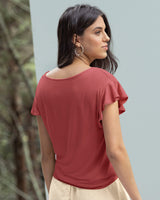 Camiseta con boleros y detalle de borlas#color_221-terracota-claro