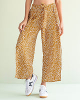 Pantalón culotte estampado con elástico y anudado en pretina#color_145-estampado-amarillo