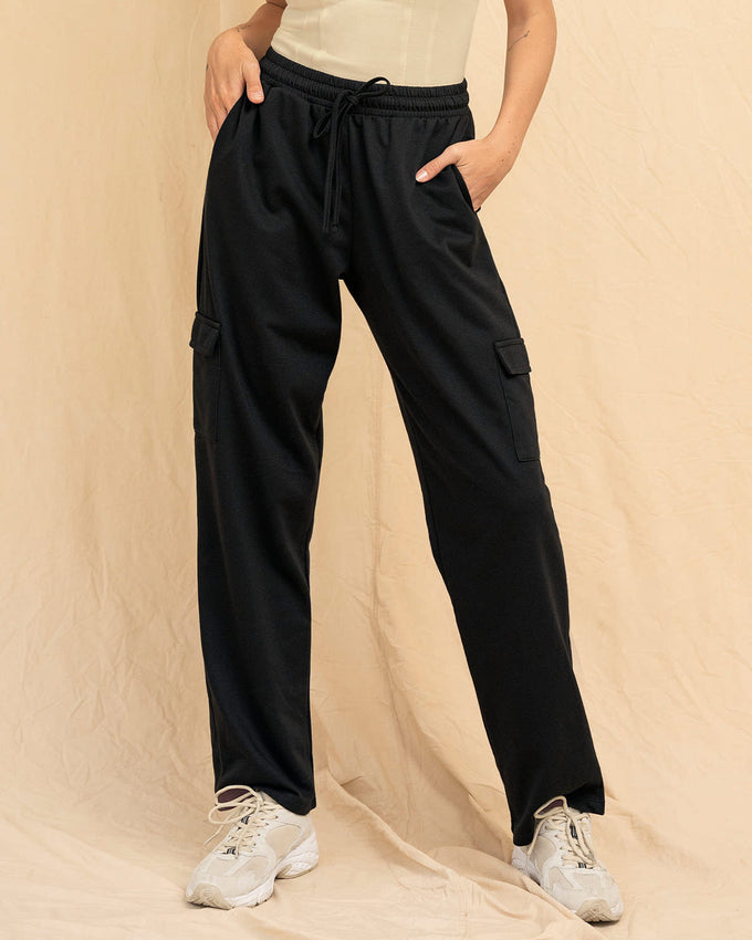 Pantalón largo con elástico en cintura y bolsillos laterales#color_700-negro
