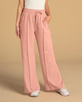 Pantalón tipo jogger con bota ancha#color_180-palo-rosa