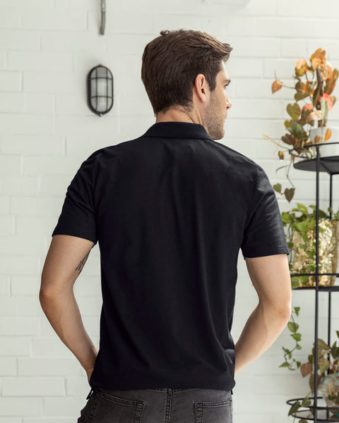 Camiseta tipo polo en jersey#color_700-negro